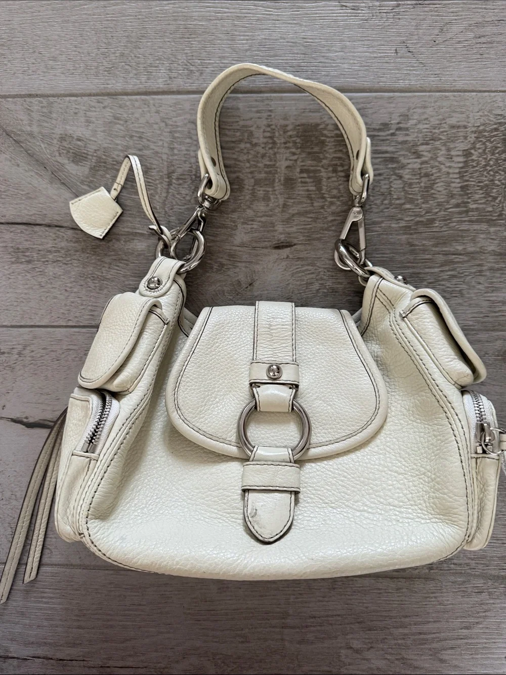 Banana Republic Cream Leather Shoulder Bag with Ring Detail needs good cleaning